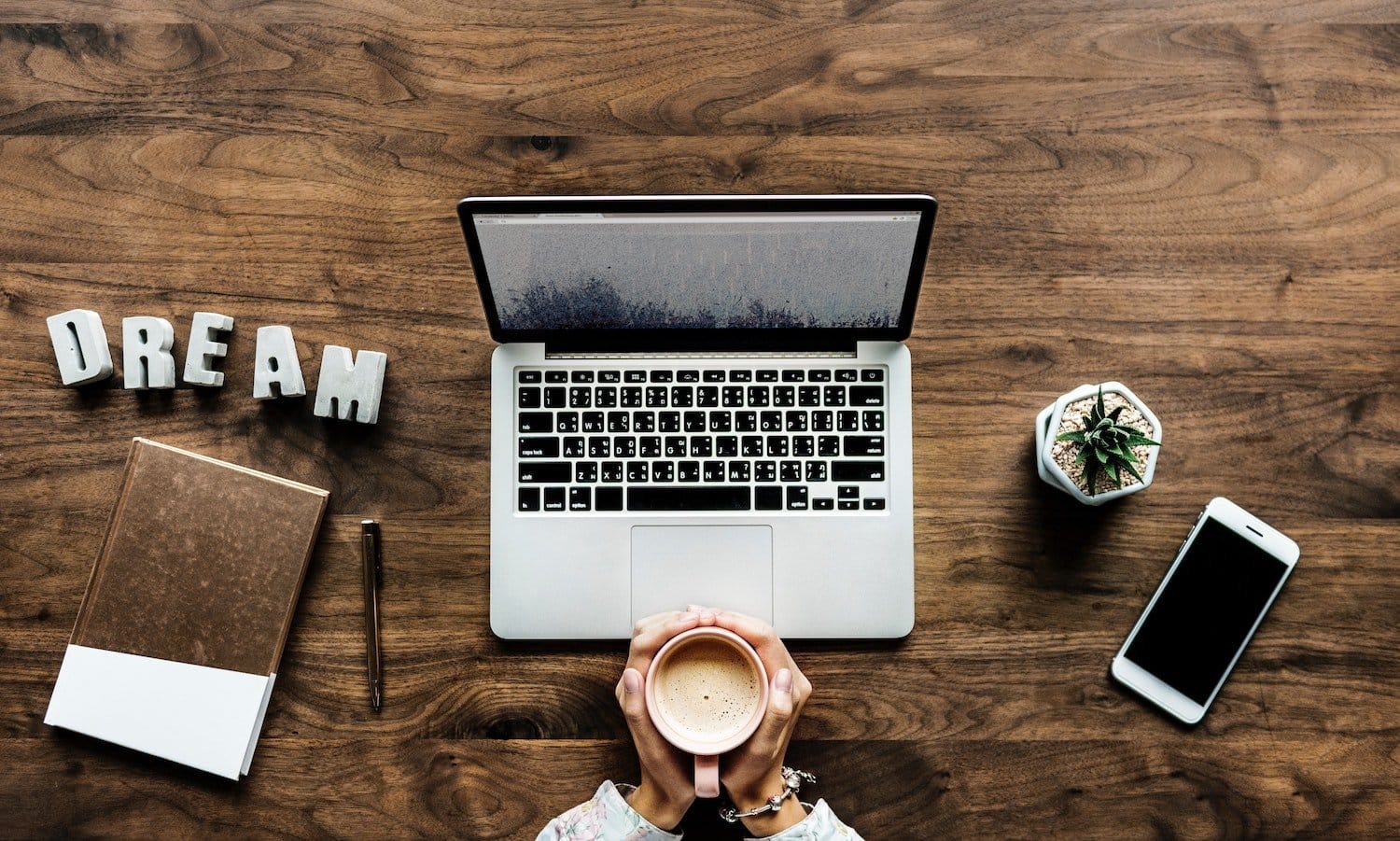 New Teacher Tips: Building an Online Presence. Picture of coffee, laptop, the work DREAM