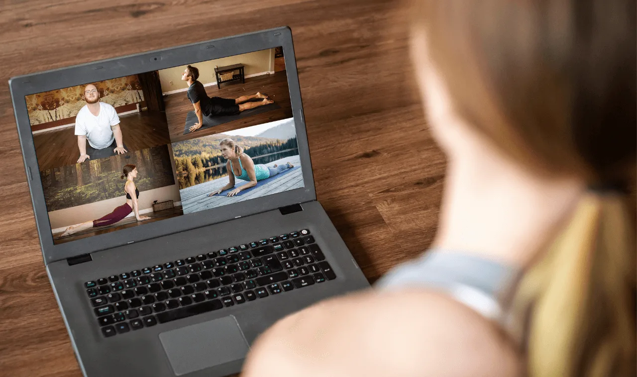 40 woman leading an online class from her laptop