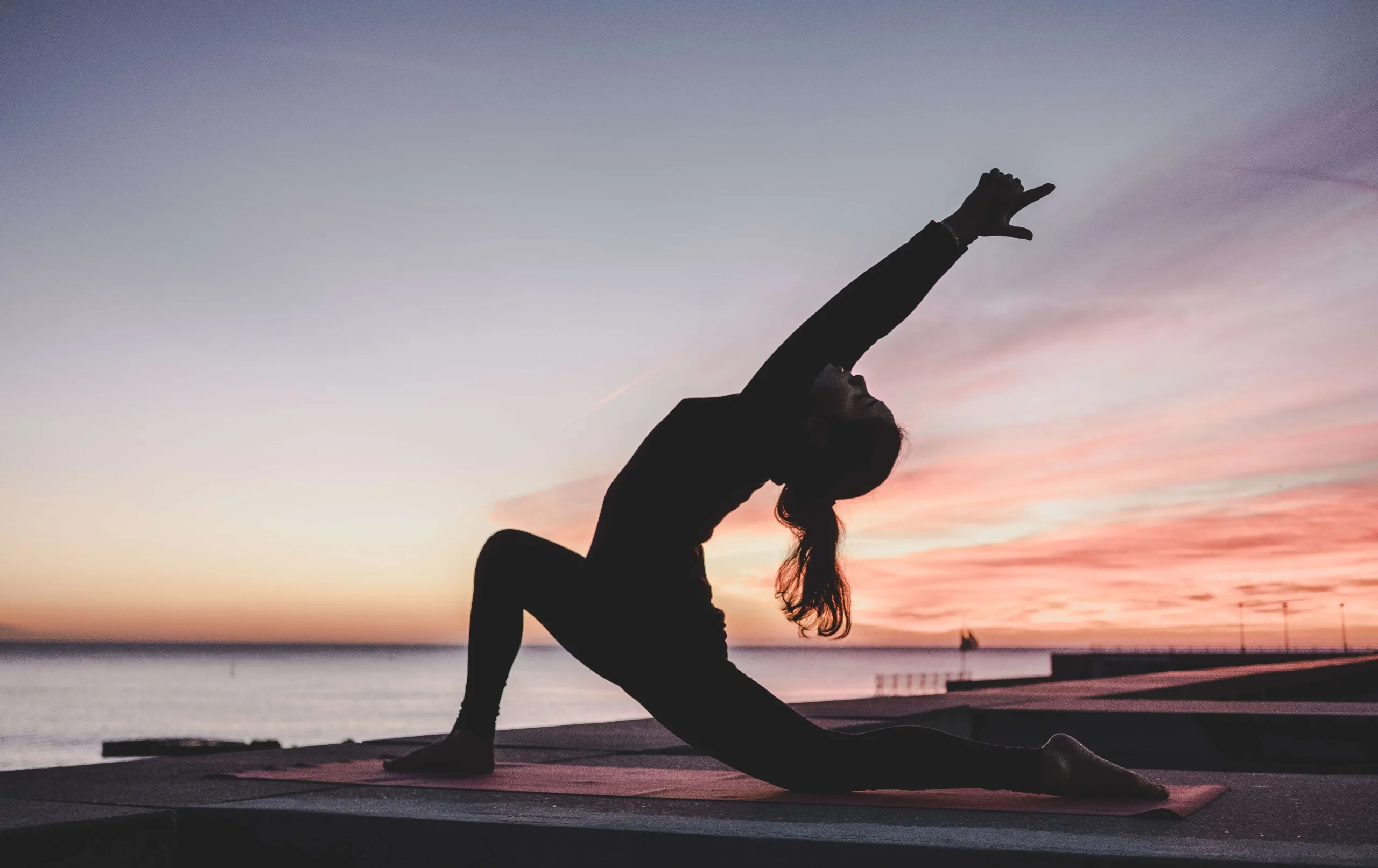 square-space-alternative-cover-photo | OfferingTree Silhouette of a woman doing yoga on a beach at sunset