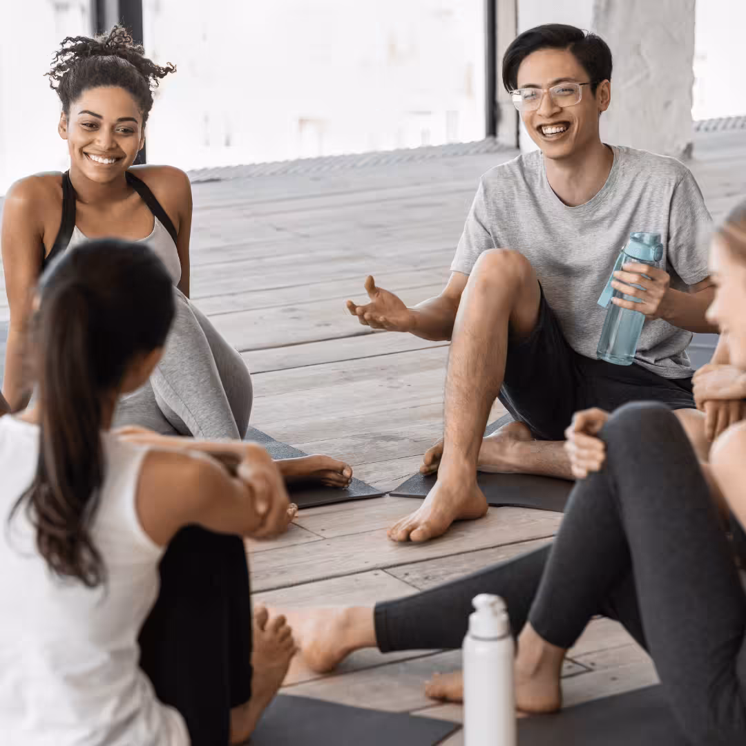 Yoga students hanging out after class Yoga students hanging out after class